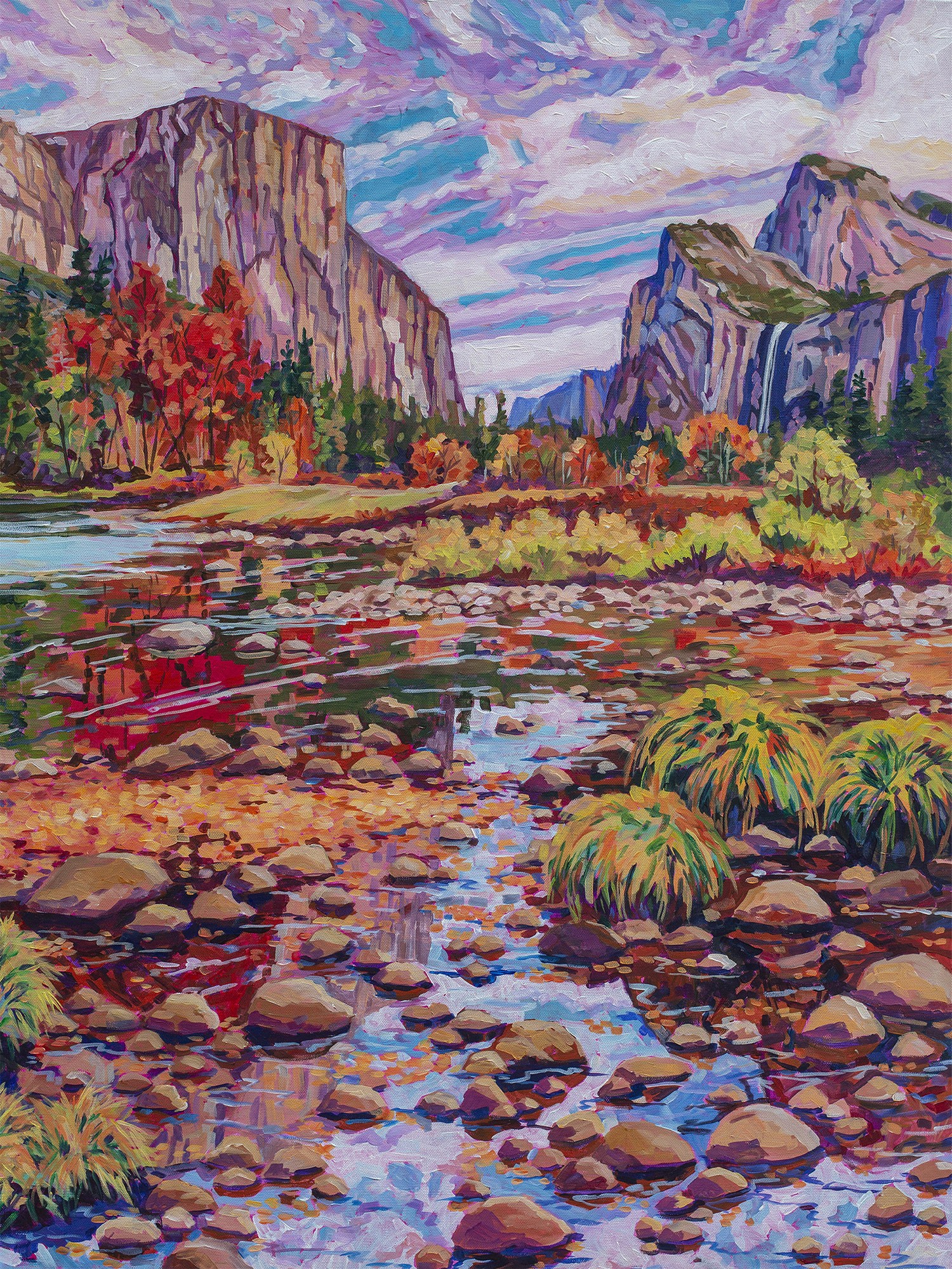 Yosemite valley in autumn showing river, exposed stone mountains of El Captain and Bridalveil falls in the background of Yosemite National Park in California