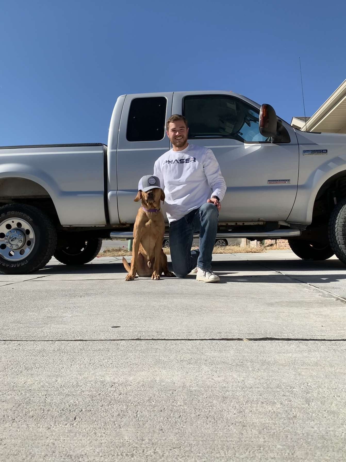 Jacob and his dog sportin some PM Merch