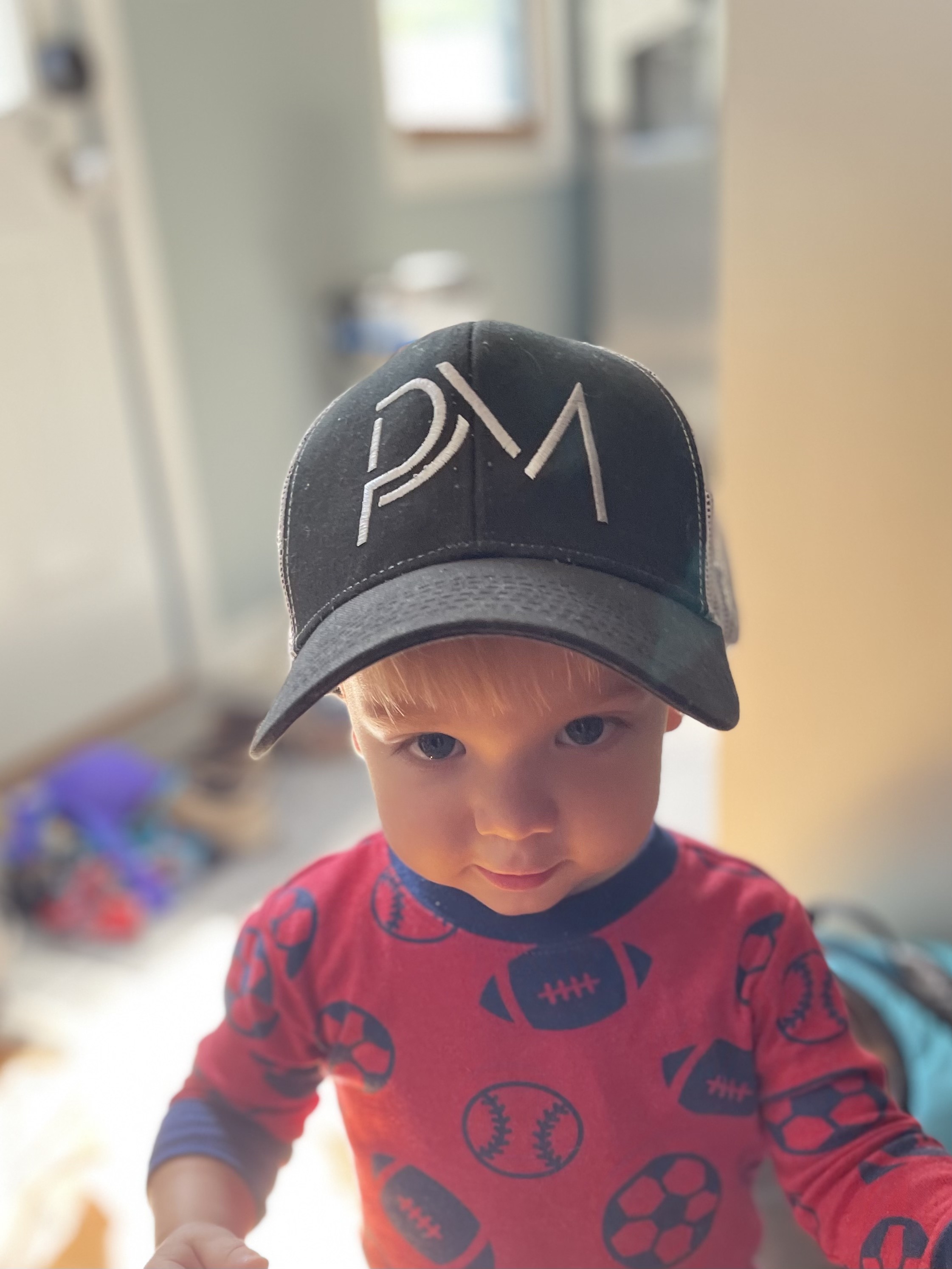 Kit wearing our 1ED PM Hat