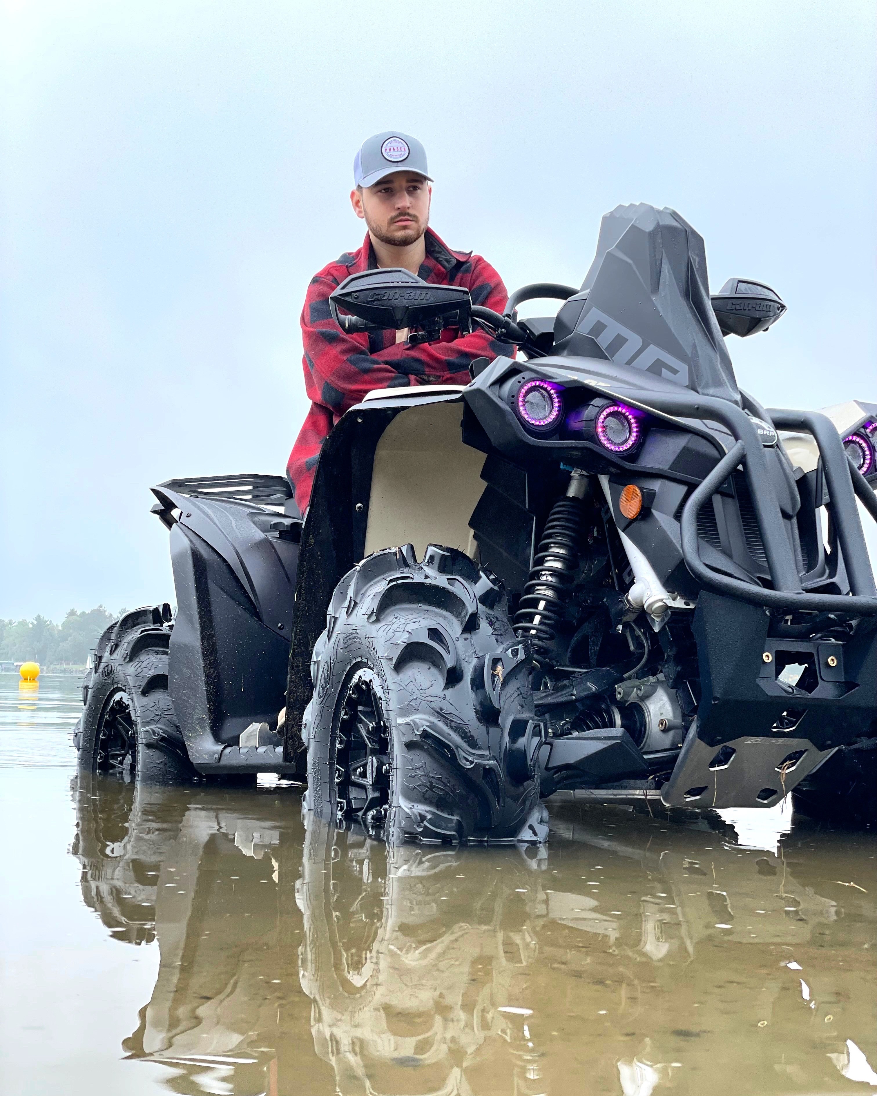 Conner wearing our 3ED hat while riding his canam