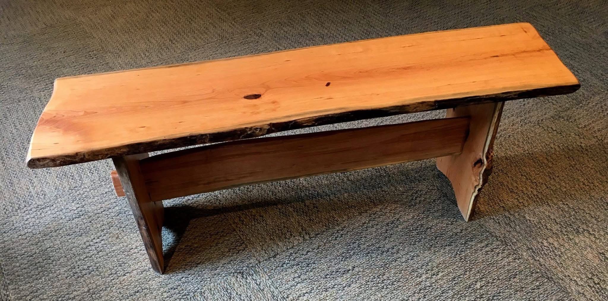 Cherry Live edge bench with wooden legs and wooden crossbar