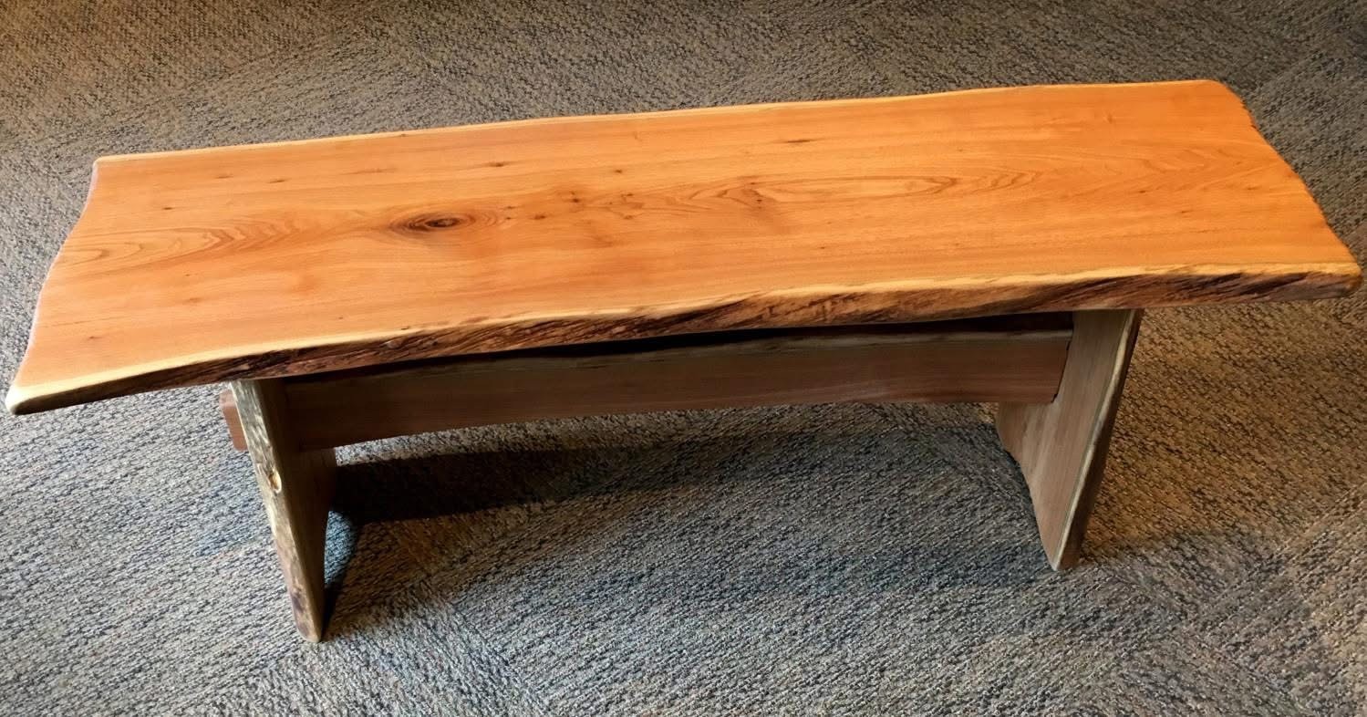 cherry live edge bench with wooden legs and crossbar