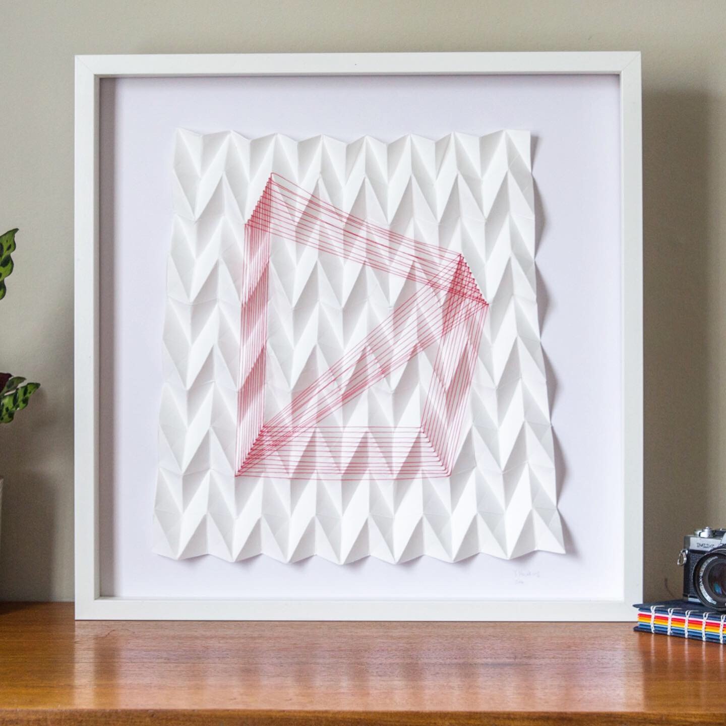 Origami art with thread