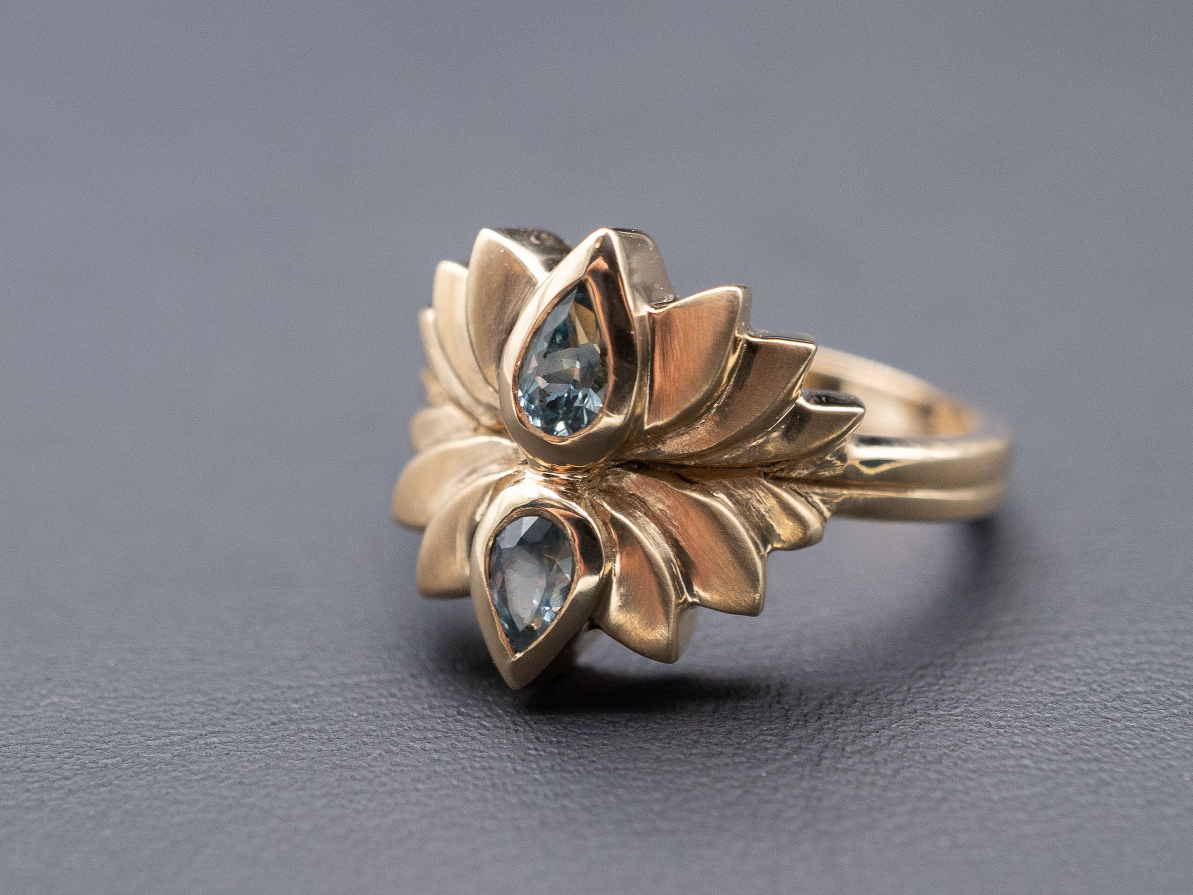 Gold Lotus Engagement Ring with Montana Sapphire