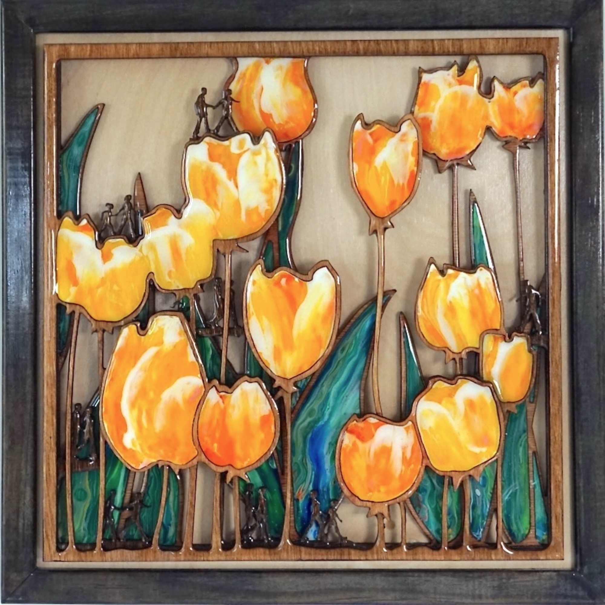 Tulip Mosaic wall Sculpture. Silhouettes of people walking in a Tulip garden made from wood mosaics