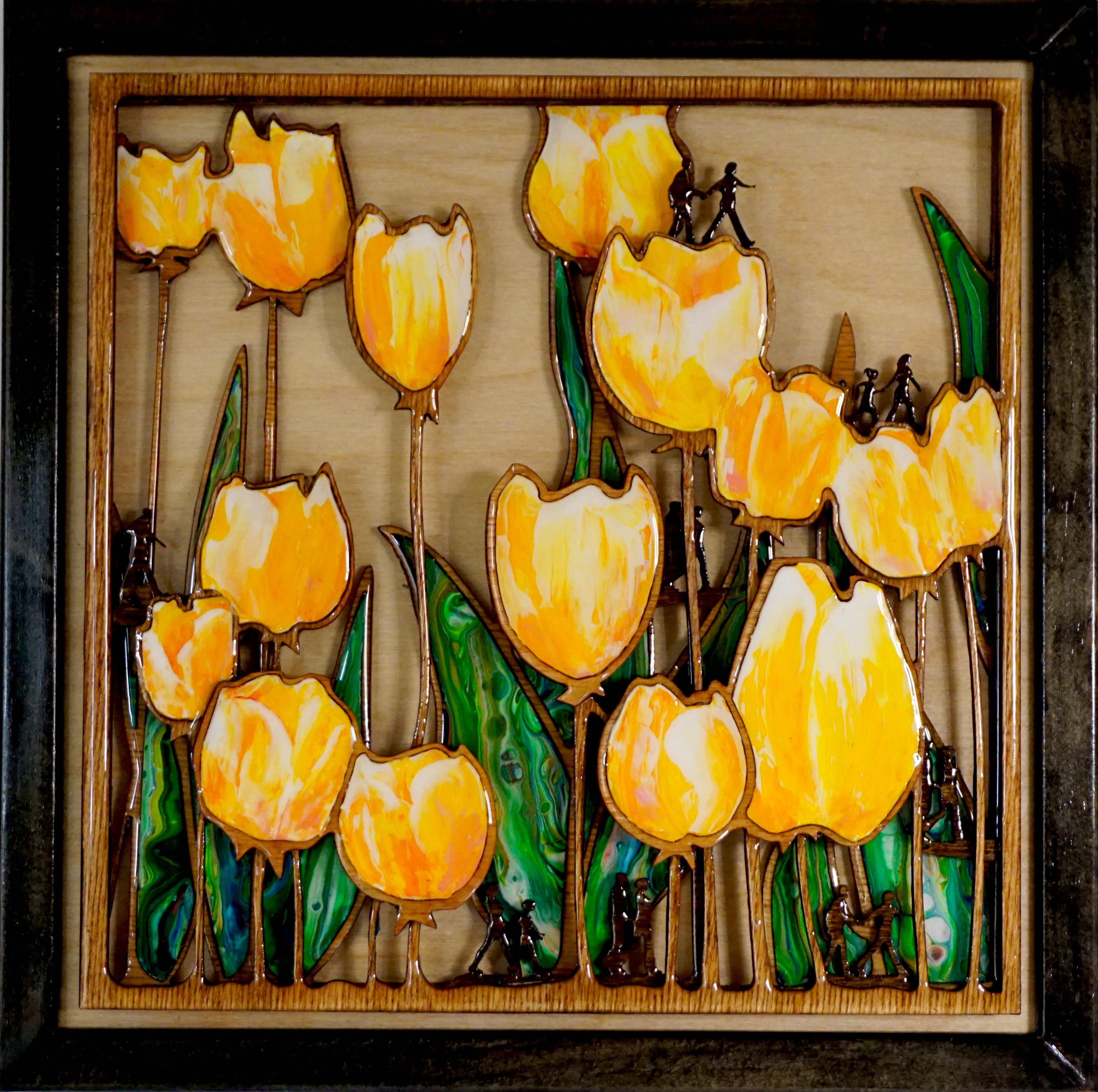 Flower wall sculpture, mosaic floral inlay and silhouette of small people walking amongst the yellow flowers